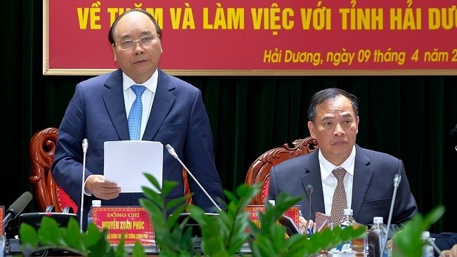 PM Phuc speaking at the working session with Hai Duong provincial leaders. (NDO/Photo: Tran Hai)