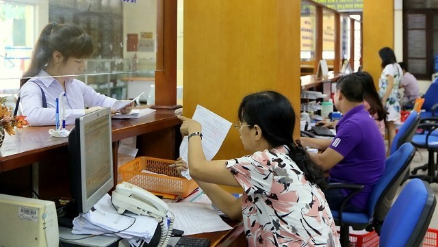 The Ministry of Finance plans to cut hundreds of tax and customs offices. (Photo: thanhnien.vn)