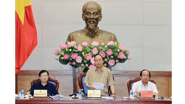 PM Nguyen Xuan Phuc speaks at the session. (Photo: VNA)