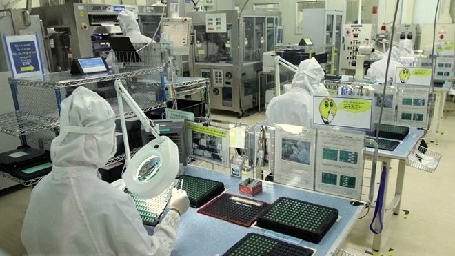 The programme is the first step to improve competitiveness of domestic firms. (Photo: VNA)