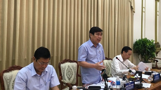 Chairman of the Ho Chi Minh City People’s Committee Nguyen Thanh Phong speaks at the meeting.