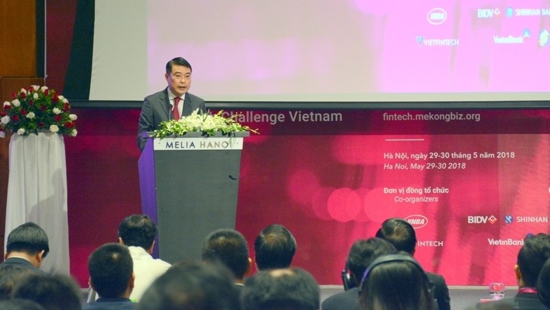 SBV Governor Le Minh Hung speaking at the forum (Photo: tuoitrethudo.com.vn)