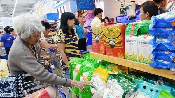 Customers shop at a supermarket in HCM City. (Photo: VNA)