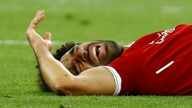 Liverpool's Mohamed Salah reacts after sustaining an injury during the Champions League final against Real Madrid, Kiev, Ukraine, May 26, 2018. (Photo: Reuters)