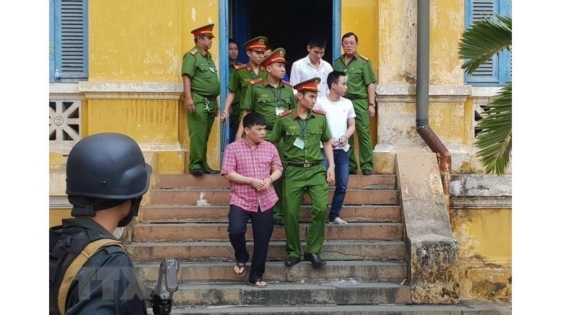 Nguyen Duc Sinh (in caro shirt) was given a ten-year sentence. (Photo: VNA)