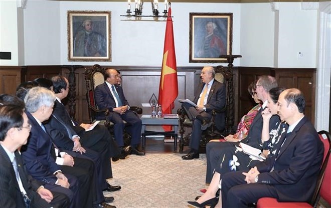 Overview of the meeting between Prime Minister Nguyen Xuan Phuc and Angel Gurria, Secretary-General of the Organisation for Economic Cooperation and Development (Photo: VNA) 