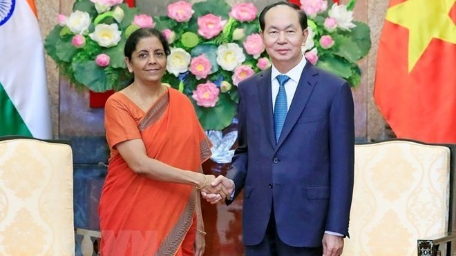 President Tran Dai Quang (R) and Indian Defence Minister Nirmala Sitharaman (Photo: VNA)