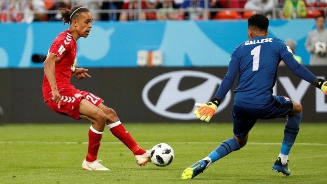 Denmark's Yussuf Poulsen scores their first goal. (Photo: Reuters)