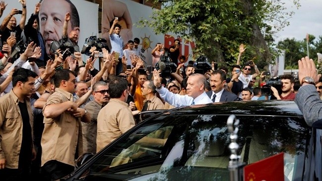 Turkish President Tayyip Erdogan waves to supporters as he leaves his residence in Istanbul, Turkey. (Photo: Reuters)