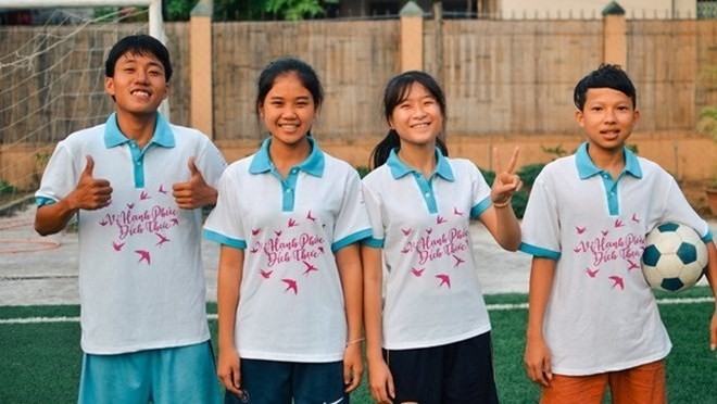 Four members of the Vietnamese team participating in FIFA’s Football for Hope Festival 2018 in Russia (Photo: VNA)