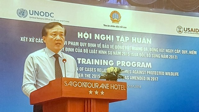 Chief Justice of Supreme People's Court, Nguyen Hoa Binh, speaks at the training programme. (Photo: congly.vn)