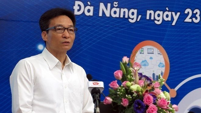 Deputy Prime Minister Vu Duc Dam speaks at the workshop in Da Nang on July 23 (Photo: VNA)