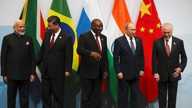 The leaders of BRICS member countries pose for a group picture at the BRICS summit meeting in Johannesburg, South Africa, July 26, 2018. (Photo: Reuters)