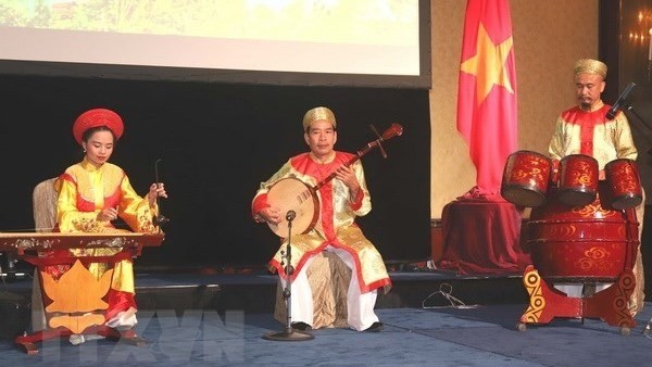 An art performance at the event (Source: VNA)