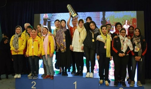 The Vietnamese women's team (left) on the podium of the 2018 Asian Nations Cup.