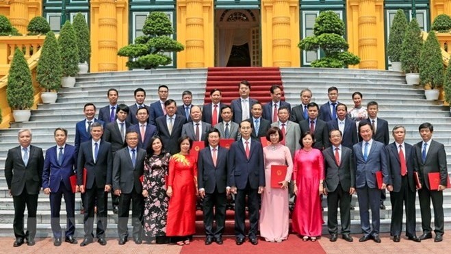 President Tran Dai Quang with the newly-accredited ambassadors and heads of Vietnamese representative offices overseas. (Photo: VNA)