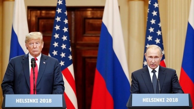 US President Donald Trump and Russian President Vladimir Putin pictured during their summit in Helsinki on July 16, 2018. (Reuters) 