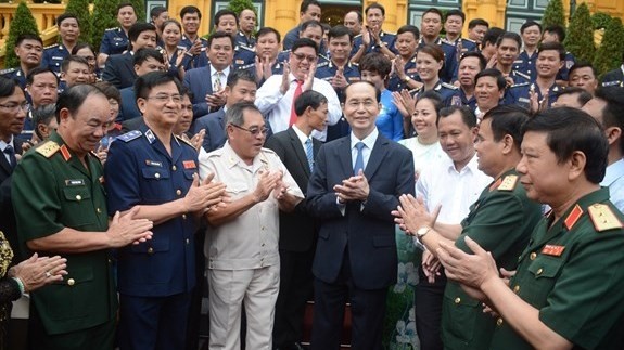 President Tran Dai Quang and delegates at the event (Photo: qdnd.vn)