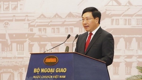 Deputy Prime Minister and Minister of Foreign Affairs Pham Binh Minh opens the 30th Diplomatic Conference (Photo: VNA)