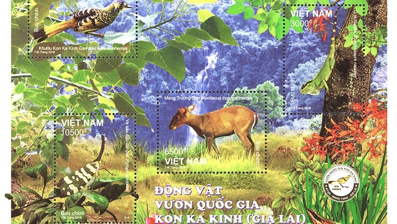The stamp block depicts the natural environment of the animals at Kon Ka Kinh National Park