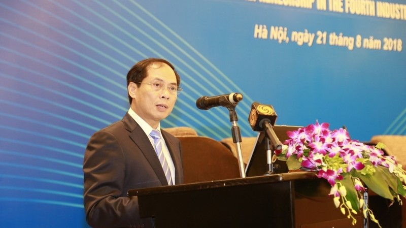 Deputy Foreign Minister Bui Thanh Son addressing the event (Photo: baoquocte.vn)