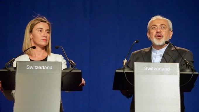 EU High Representative Mogherini and Iranian Foreign Minister Zarif address reporters following negotiations between P5+1 member nations and Iranian officials about future of Iran's nuclear programme.