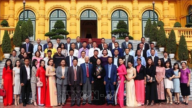 Vice President Dang Thi Ngoc Thinh (front row, centre) and delegates at a reception in Hanoi on September 13 for participating businesses and entrepreneurs (Photo: VNA)