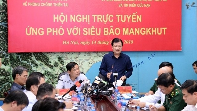 Deputy PM Trinh Dinh Dung speaking at a conference on the preparations for Typhoon Mangkhut.