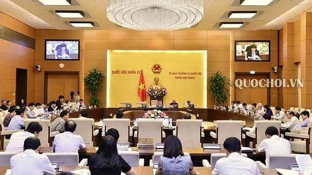 The NA Standing Committee discusses a Government report on the results of two years of the implementation of Resolution No. 76/2014/QH13 on stepping up sustainable poverty reduction by 2020, Hanoi, September 17, 2018. (Photo: quochoi.vn)