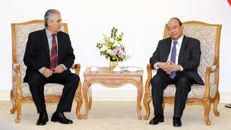 Prime Minister Nguyen Xuan Phuc and WFTU General Secretary George Mavrikos (Photo: Tran Hai)