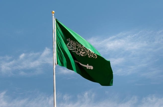 The national flag of Saudi Arabia.