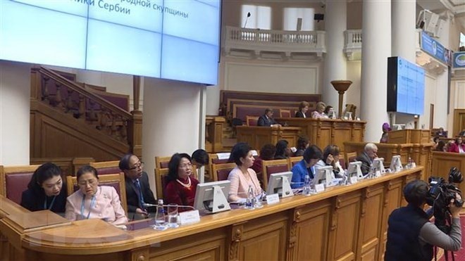 Vice President Dang Thi Ngoc Thinh (in red, second from left) attends the plenary session of the second Eurasian Women's Forum. (Photo: VNA)