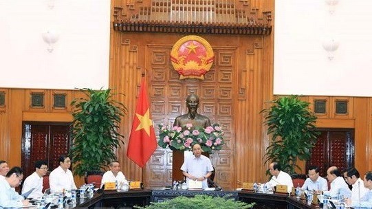 Prime Minister Nguyen Xuan Phuc at the working session (Source: VNA)