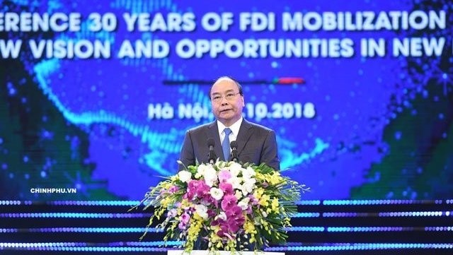 Prime Minister Nguyen Xuan Phuc addresses the conference. (Photo: NDO/To Ha)