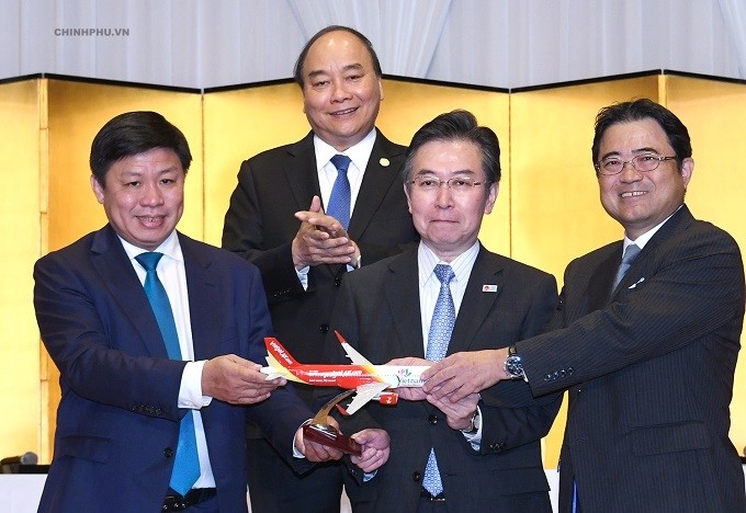 PM Nguyen Xuan Phuc witnesses the opening of three new direct air routes connecting Vietnam and Japan. (Photo: VGP)