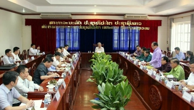 The high ranking delegation from the Communist Party of Vietnam work with Lao Vientiane province authorities in Vientiane, Laos on October 10. (Photo: NDO)