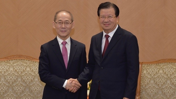 Deputy PM Trinh Dinh Dung (right) and IPCC Chair Hoesung Lee. (Photo: VGP)