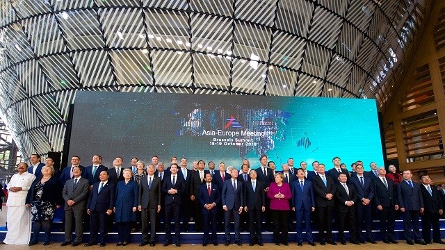 ASEM leaders join in a group photo at the 12th ASEM Summit in Brussels, Belgium. (Photo: European Council)