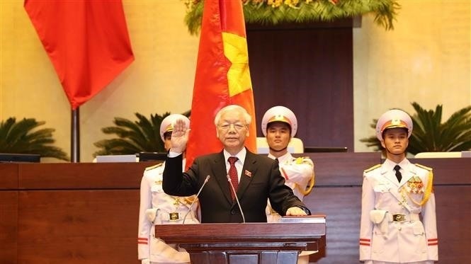 Party General Secretary Nguyen Phu Trong vows to stay absolutely loyal to the nation, the people and the Constitution of the Socialist Republic of Vietnam, and to exert every effort to complete all missions assigned by the Party, State and people as he is elected State President. (Photo:VNA)