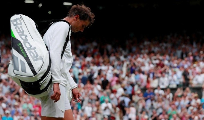 Spain's Rafael Nadal looks dejected after losing his semi final match at Wimbledon on July 14, 2018. (Reuters)