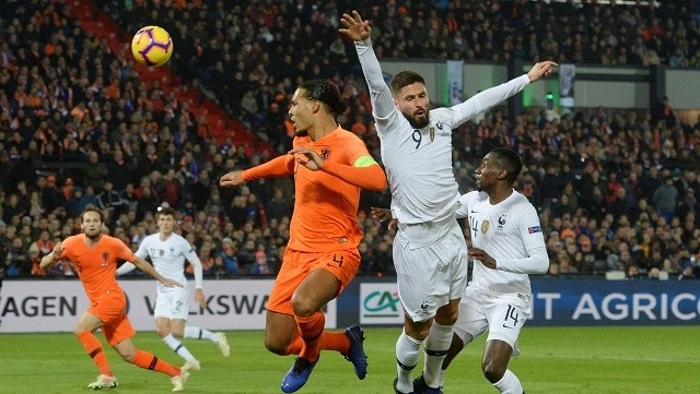 France's Olivier Giroud in action with Netherlands' Virgil Van Dijk - UEFA Nations League - League A - Group 1 - Netherlands v France - De Kuip, Rotterdam, Netherlands - November 16, 2018. (Photo: Reuters)