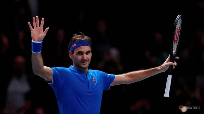 Switzerland's Roger Federer celebrates winning his group stage match against South Africa's Kevin Anderson. (Reuters)