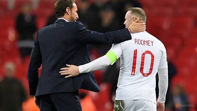 England's Wayne Rooney with manager Gareth Southgate at the end of the match. (Reuters)