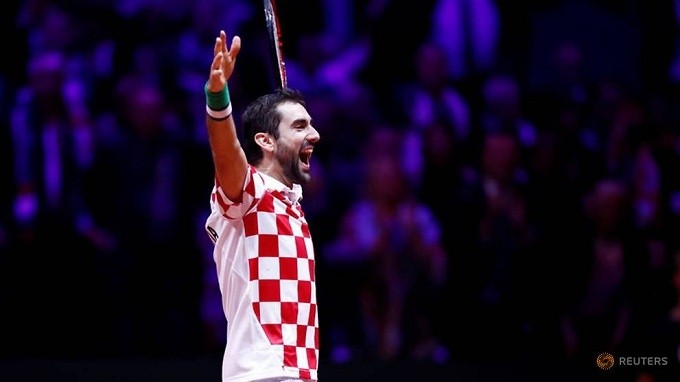 Croatia's Marin Cilic celebrates after winning his match against France's Lucas Pouille. (Reuters)