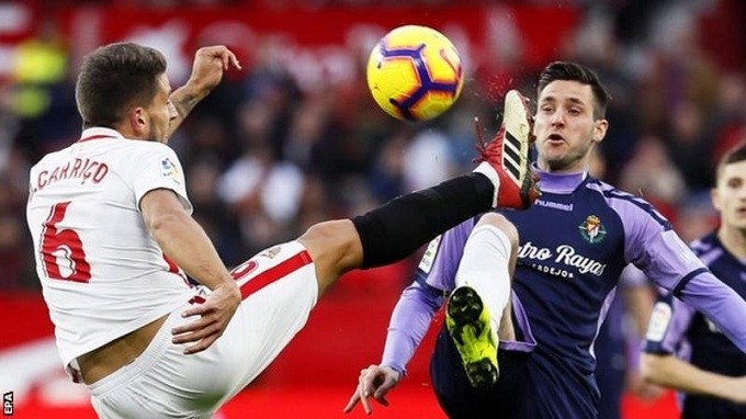 Sevilla (in white) are unbeaten in their last seven league and cup games. (Photo: EPA)