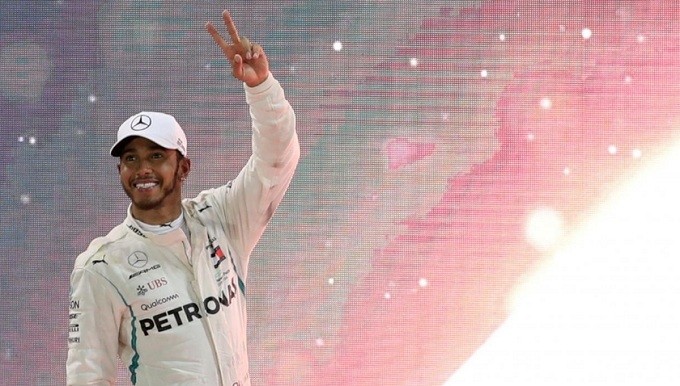Formula One F1 - Abu Dhabi Grand Prix - Yas Marina Circuit, Abu Dhabi, United Arab Emirates - November 25, 2018 Mercedes' Lewis Hamilton celebrates winning the race. (Reuters)
