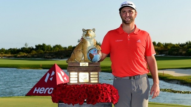 Jon Rahm poses with the tournament trophy after winning the Hero World Challenge at Albany Golf Club in Nassau, Bahamas on Sunday. (Photo: Getty Images)