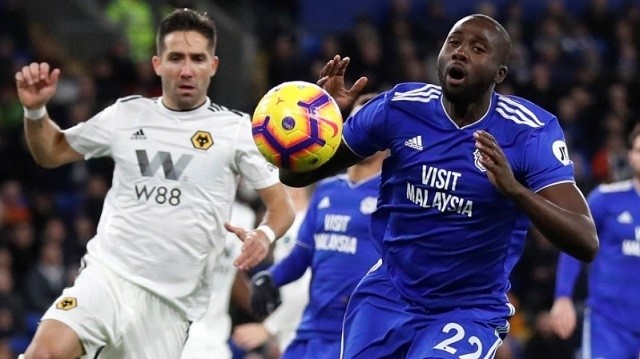 Cardiff City's Sol Bamba reacts as Wolverhampton Wanderers' Joao Moutinho looks on during their Premier League clash at Cardiff City Stadium, Cardiff, Britain, on November 30, 2018. (Photo: Action Images via Reuters) 