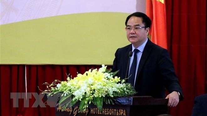 Vu Chien Thang, head of the Government Committee for Religious Affairs, speaks at the conference. (Photo: VNA)