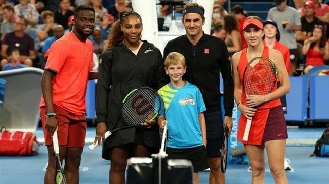 Roger Federer (second right) and Serena Williams have won a combined 43 Grand Slam singles titles. (Photo: Getty Images)
